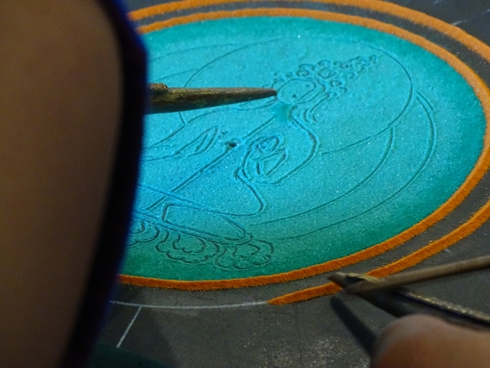 Green Tara's outline is nearly ready for the layers of sand that will maker her 3-D.