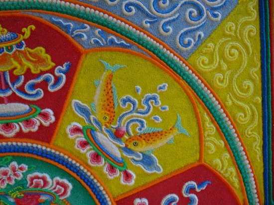 The Two Golden Fish represent good fortune and release from the ocean of samsara.